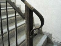 Terminal de rampe escalier avec boucle forgée en demi tour